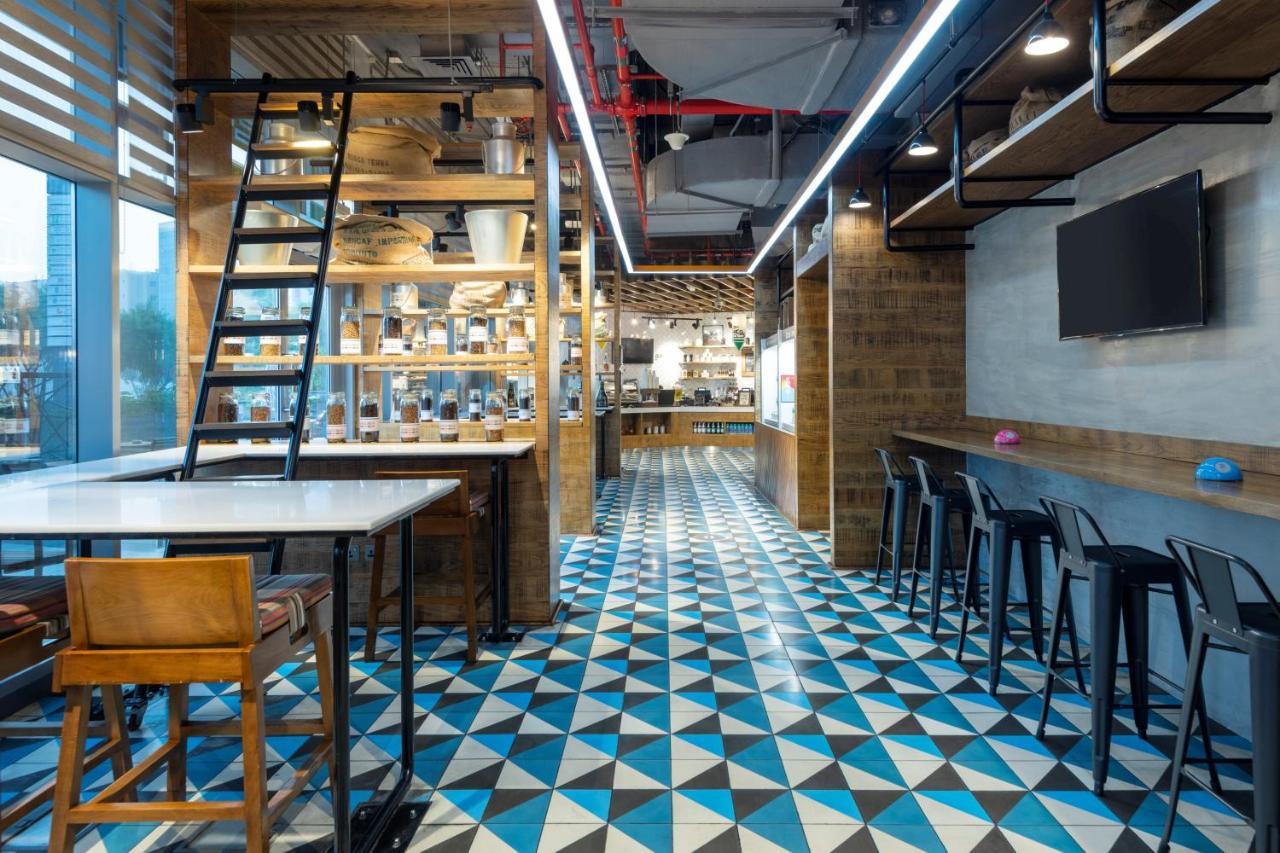 คราวน์ พลาซา โดฮา - เดอะ บิสซิเนส พาร์ค Hotel ภายนอก รูปภาพ The interior of the restaurant